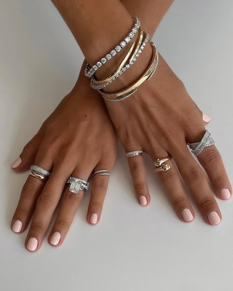 Elevate your style with this stunning stack of 925 sterling silver and gold-plated rings and bangles. Whether you're going for a modern minimalist vibe or want to flaunt a bold luxe look